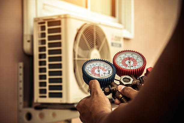Professional Air Conditioning Service technician working in Cottekill, NY